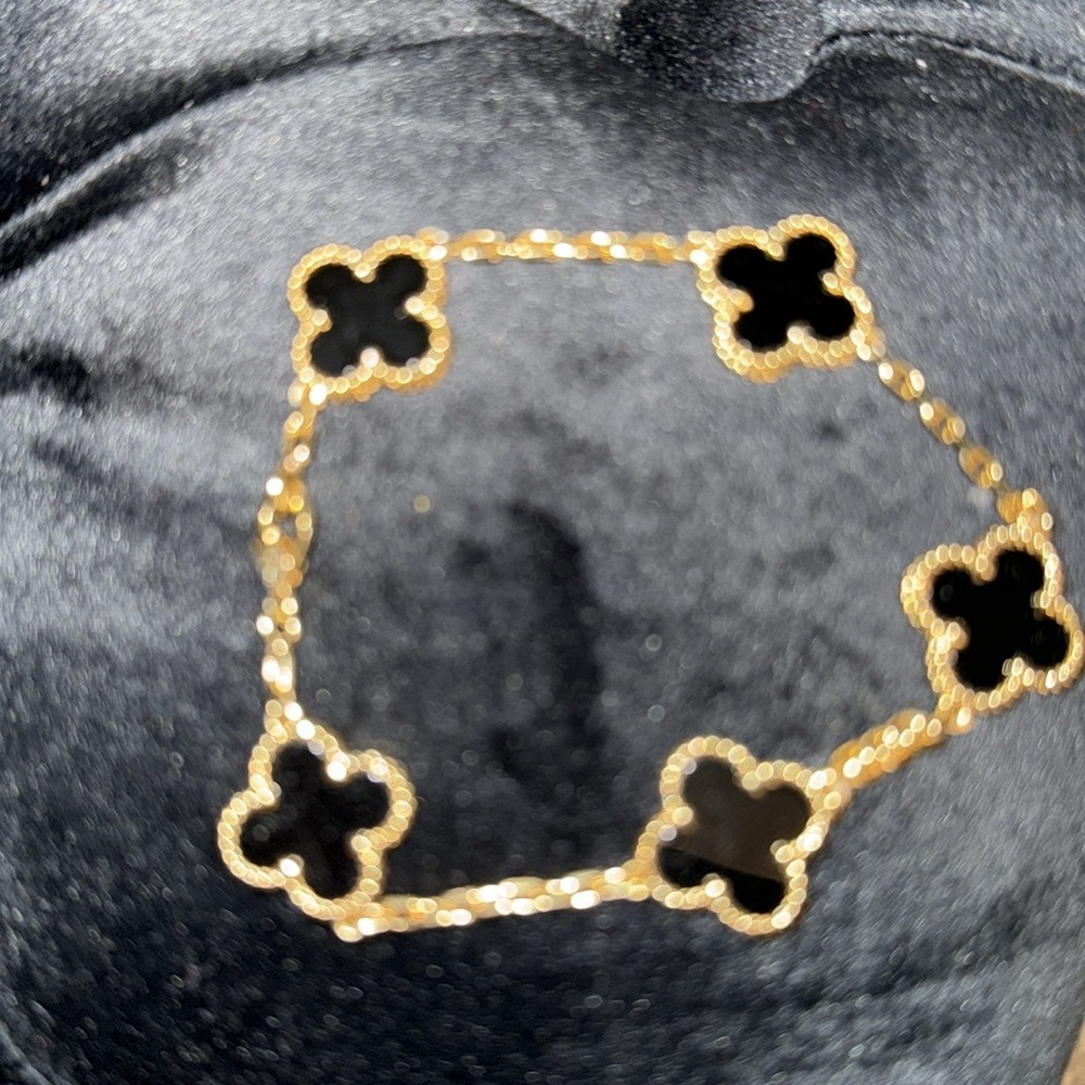 18k Gold and Black Van Vancleef Clover Bracelet